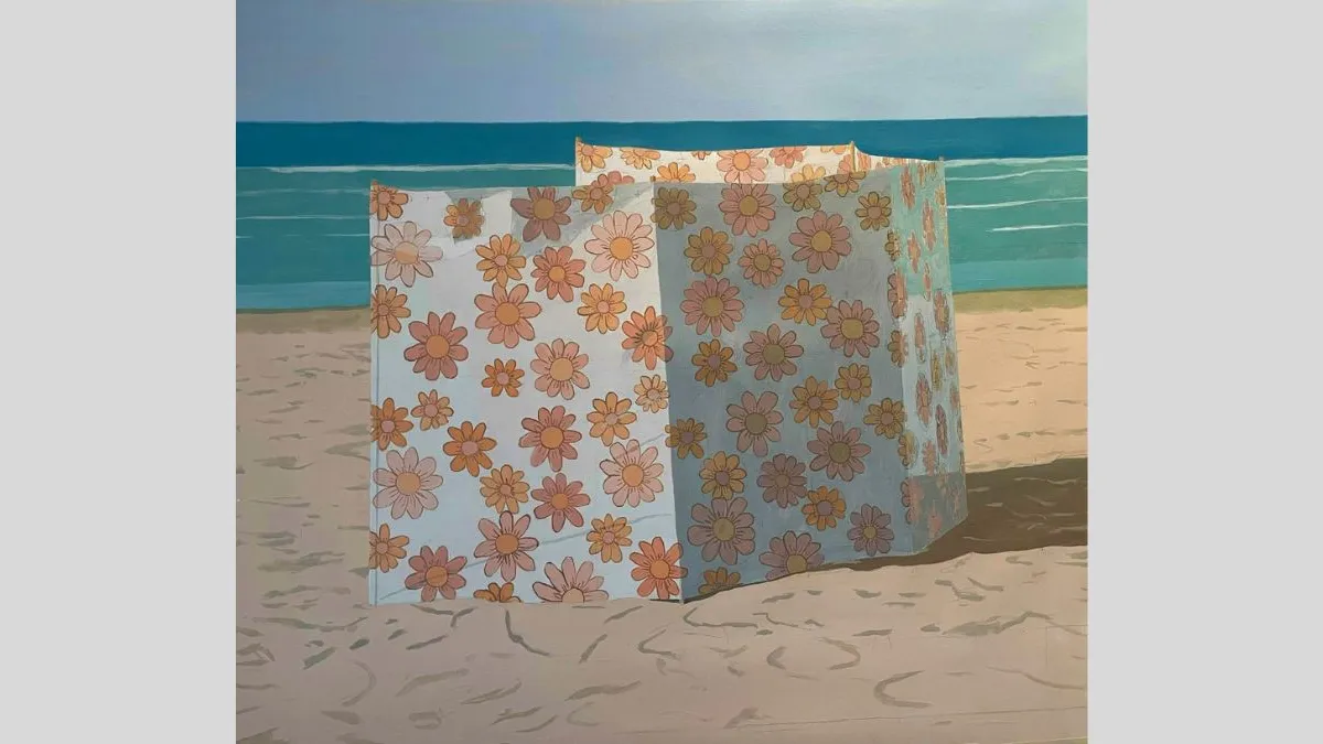 Image of a painting showing a beach scene with a patterned windbreak set up on the sand. The windbreak is decorated with large orange and yellow flowers and casts a shadow on the ground. The sea and sky are visible in the background.