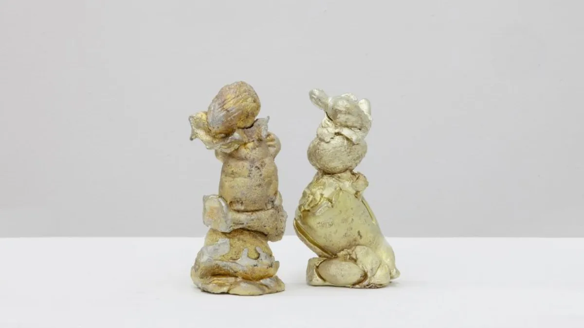 4.	Two small sculptures cast in solid pewter 