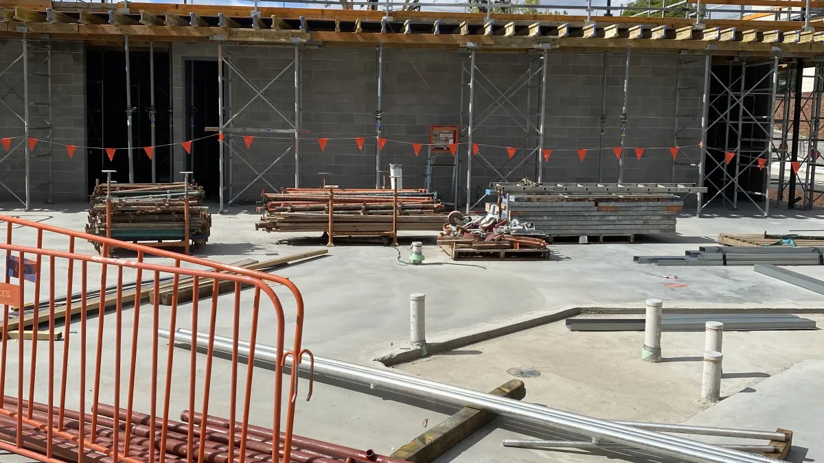 Block walls and concrete slab in a construction zone