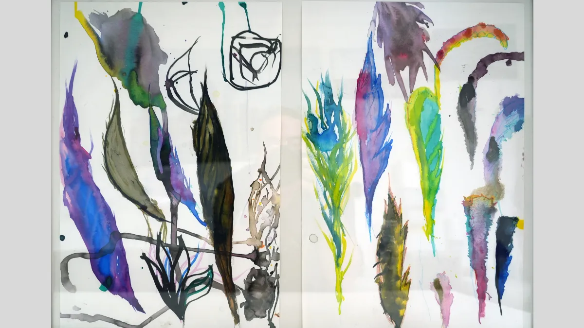 Artwork featuring colourful peacock feathers