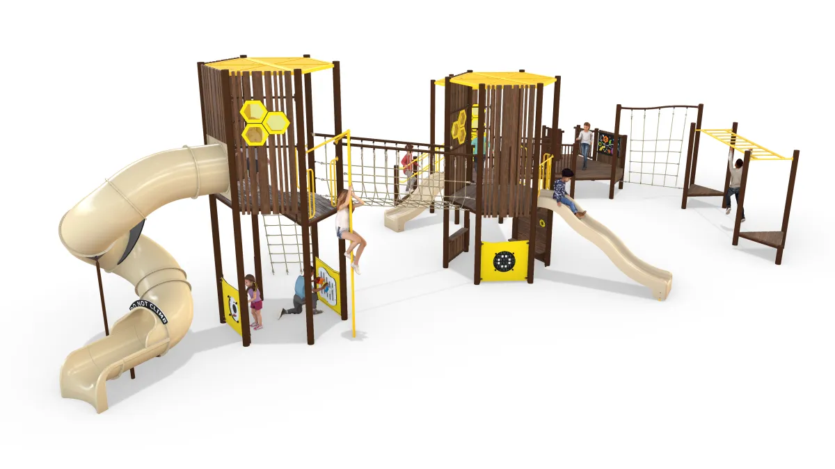 A view of the highest point of the playground where there is an enclosed, spiral slide. Leading up to it is a rope bringe. futher down are shorter slides and climbing structures.