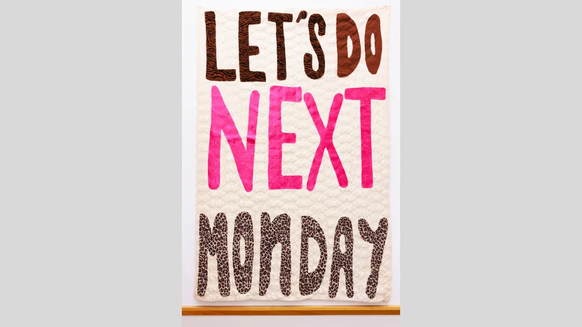 Fabric banner that says 'Let's do next Monday'