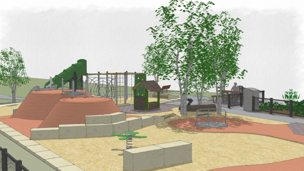 A playground with different climbing structures, a rocker and slide. Trees provide shade.