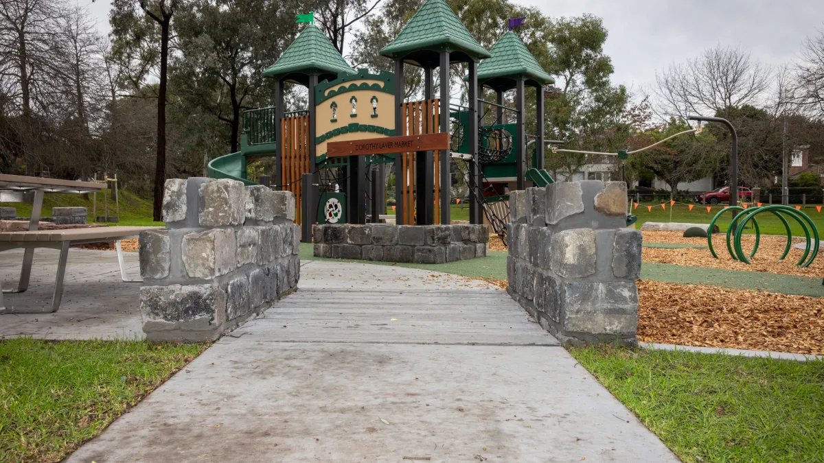 Entry pathway to an outdoor playground