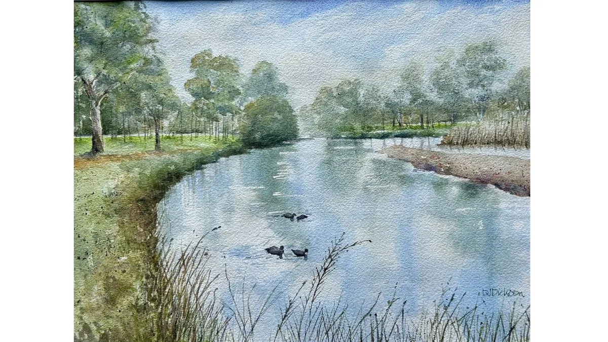 Watercolour painting of a calm waterway bordered by grasses and trees. Several small dark waterbirds float near the centre, while reflections of trees and sky stretch across the water’s surface.