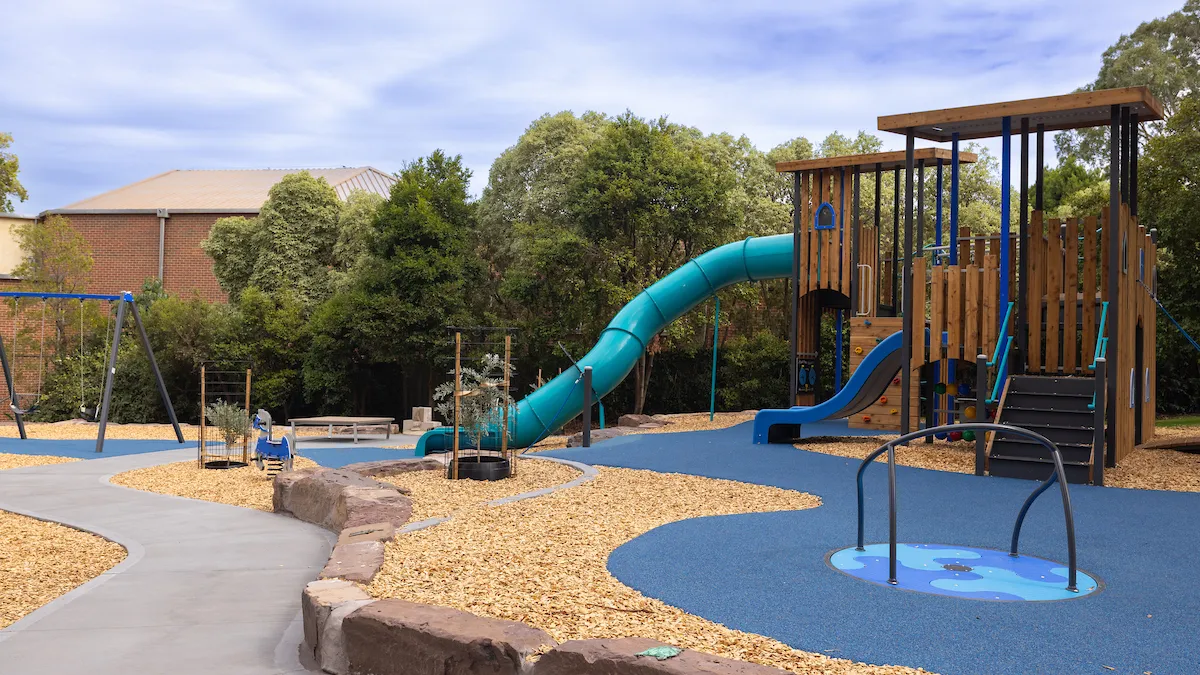  A new playground with timber climbing structure with slide