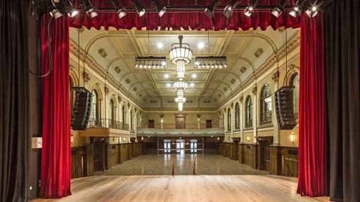 looking from the stage down the length of the main hall