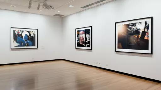 Large photographs of the seaside town of Rosebud hanging in the Town Hall Gallery in 2018