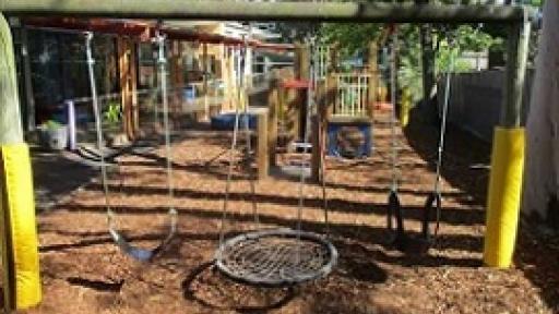 The swings in the playground at Bellevue Kindergarten
