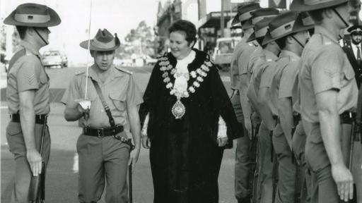 Photograph of Mayor Barbara van Ernst inspecting troops