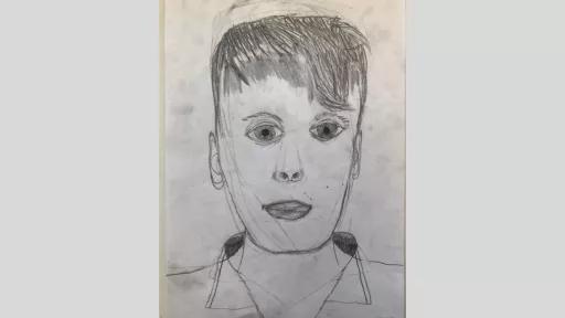 A self portrait by Archie (11 years old), created with grey lead on cartridge paper.