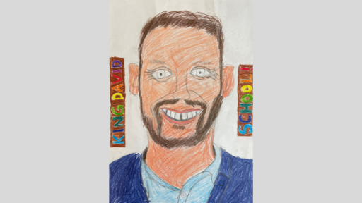 Portrait dawn in greylead and coloured pencils of a man with a beard. He is wearings a collared shirt. In the background on the left it says "King David" and on the right it says "school!"
