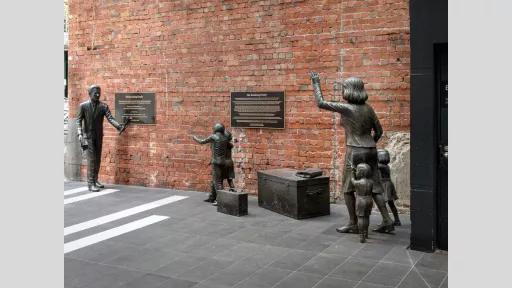 The Reuniting Family sculpture by Michael Meszaros