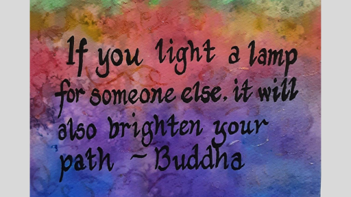 A watercolour rainbow gradient, overlaided with the text "If you light a lamp for someone else, it will also brighten your own path - Buddha"
