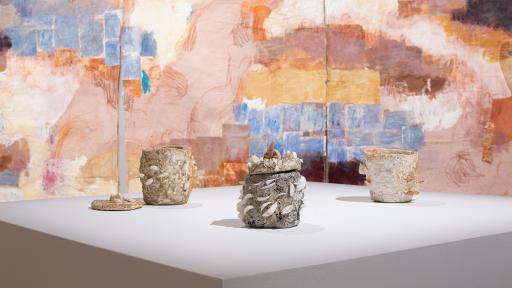 Installation view of Material Reverie at Town Hall Gallery, including 3 mugs made with shells