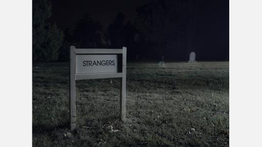 A sign at the Beechworth cemetery that says 'strangers'