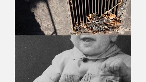 bottom half of image is a smiling baby from the mouth down, the top half is of a grate or drain in the street