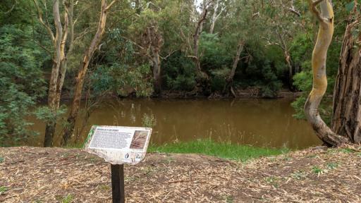 A sign on the river along the Wurundjeri Heritage Trail