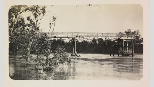 Photo of a bridge spanning a wide river