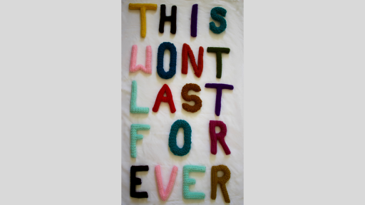 Crocheted letters in different coloured wool spelling out 'This wont last for ever'