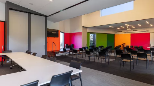 A large meeting room set up for two meetings