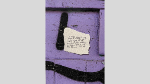 A piece of torn paper with a poem printed from a typewriter, sitting on a textured surface that is purple with black lines painted over brickwork