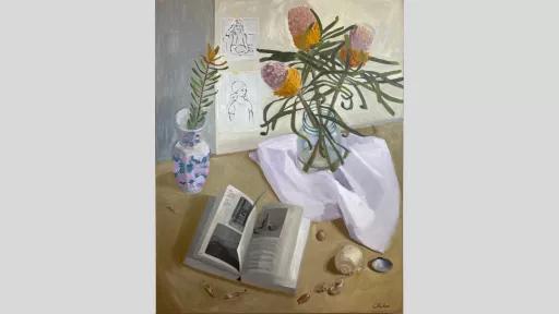 Painting of two flower bouquets in vases beside an open book