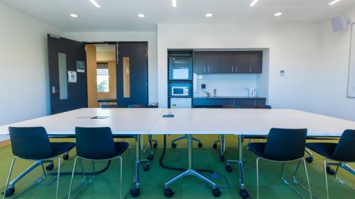 A boardroom table in a meeting room