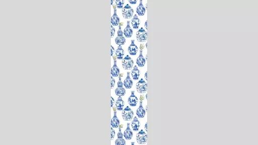 Blue and white painted vases on a white background in a repeating pattern