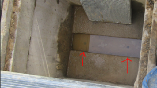 A close up photo of the sump and weepholes