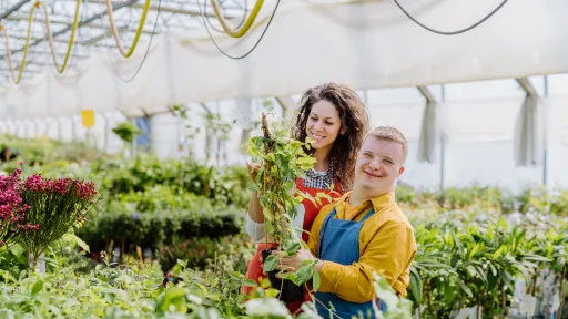 2 people gardening together