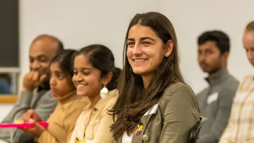 Young people sitting in a row