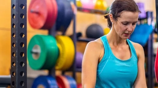 Woman stretching in a gym
