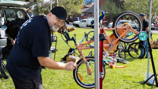 Man repairing bicycle 