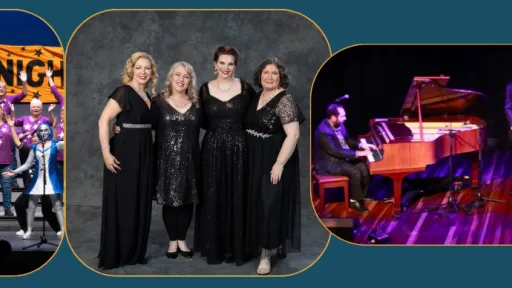 Four women in black dresses standing together arm in arm