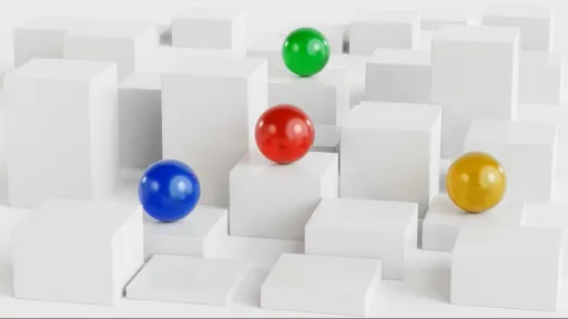 Four coloured balls sit atop white blocks