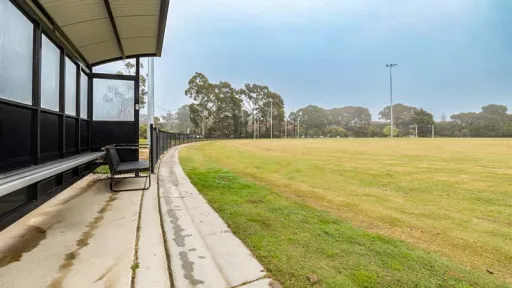 Looking from the sideline benches across the field of Frisch Holzer Oval.