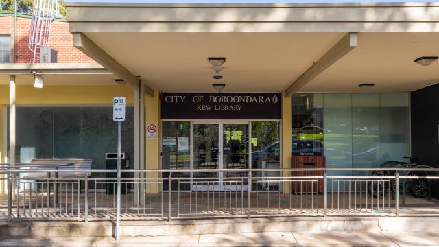 the main entrance of Kew Library painted in a dated pale yellow.
