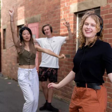 3 people dancing in a silent disco